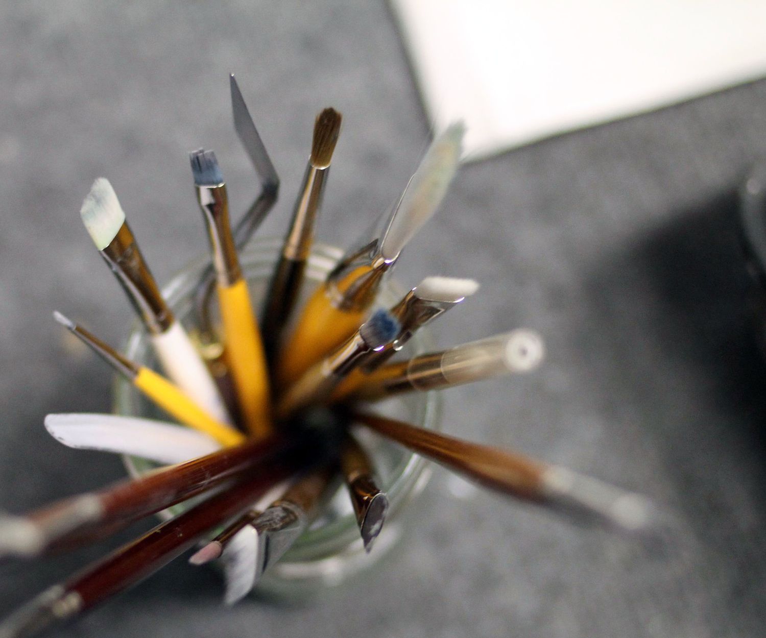 paintbrushes flared out in soft focus