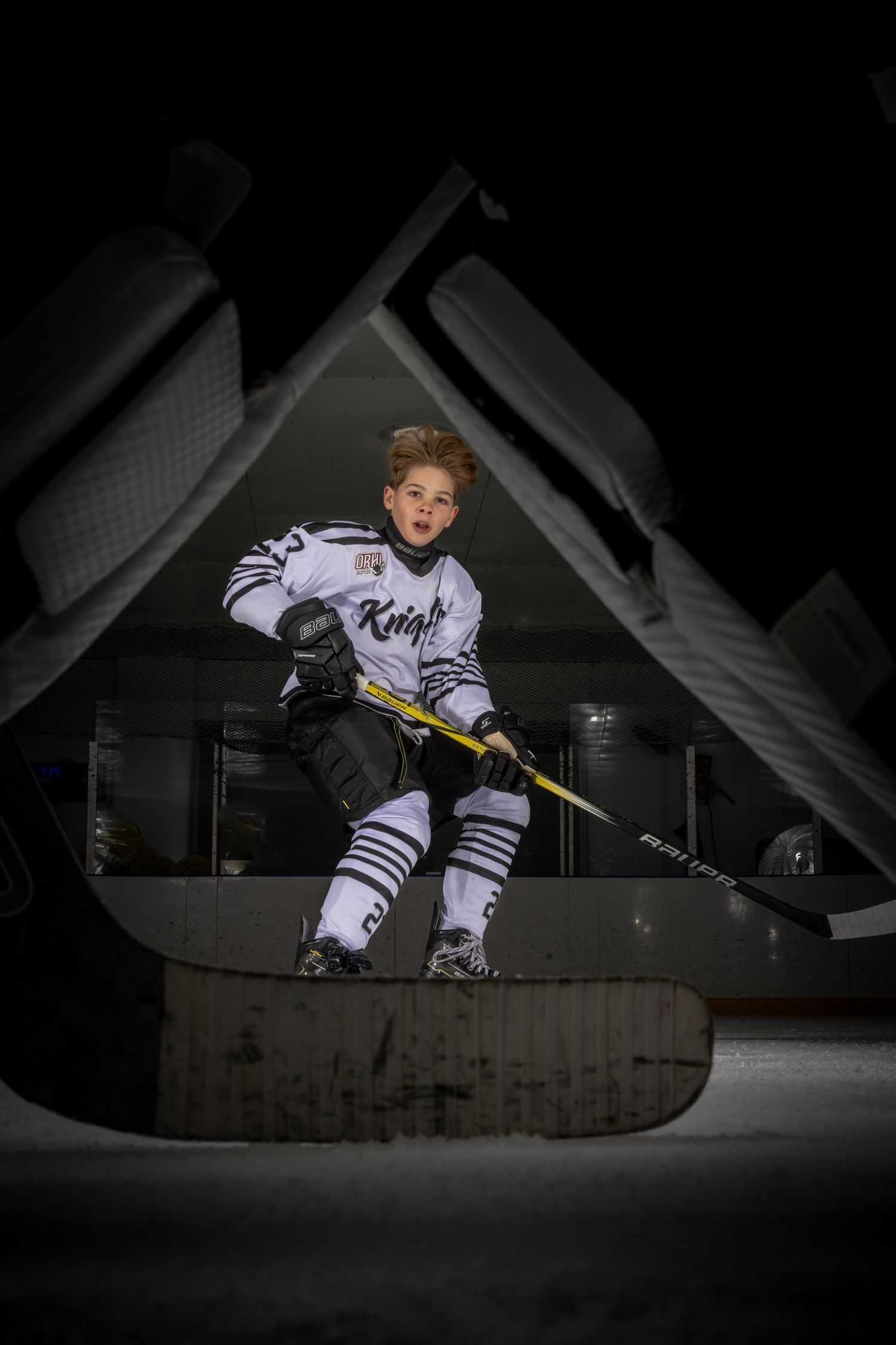 Niagara Knights player posing during an on ice session in Niagara