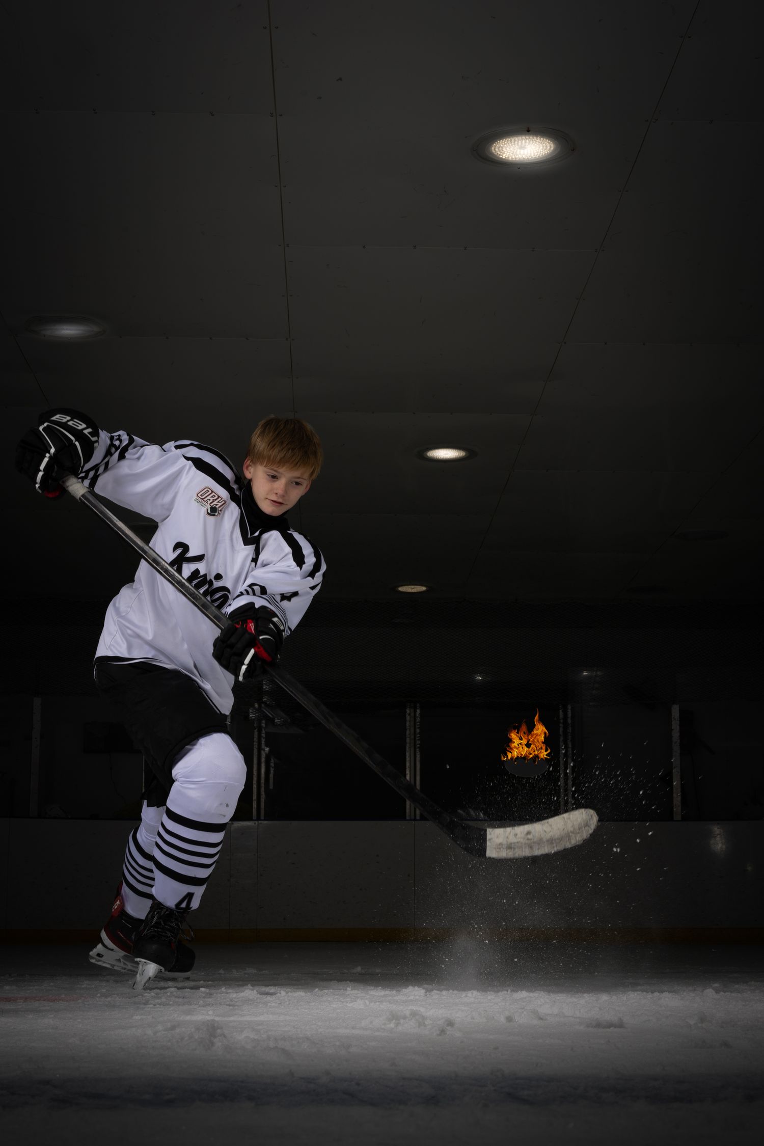 Niagara Knights player posing during an on ice session in Niagara