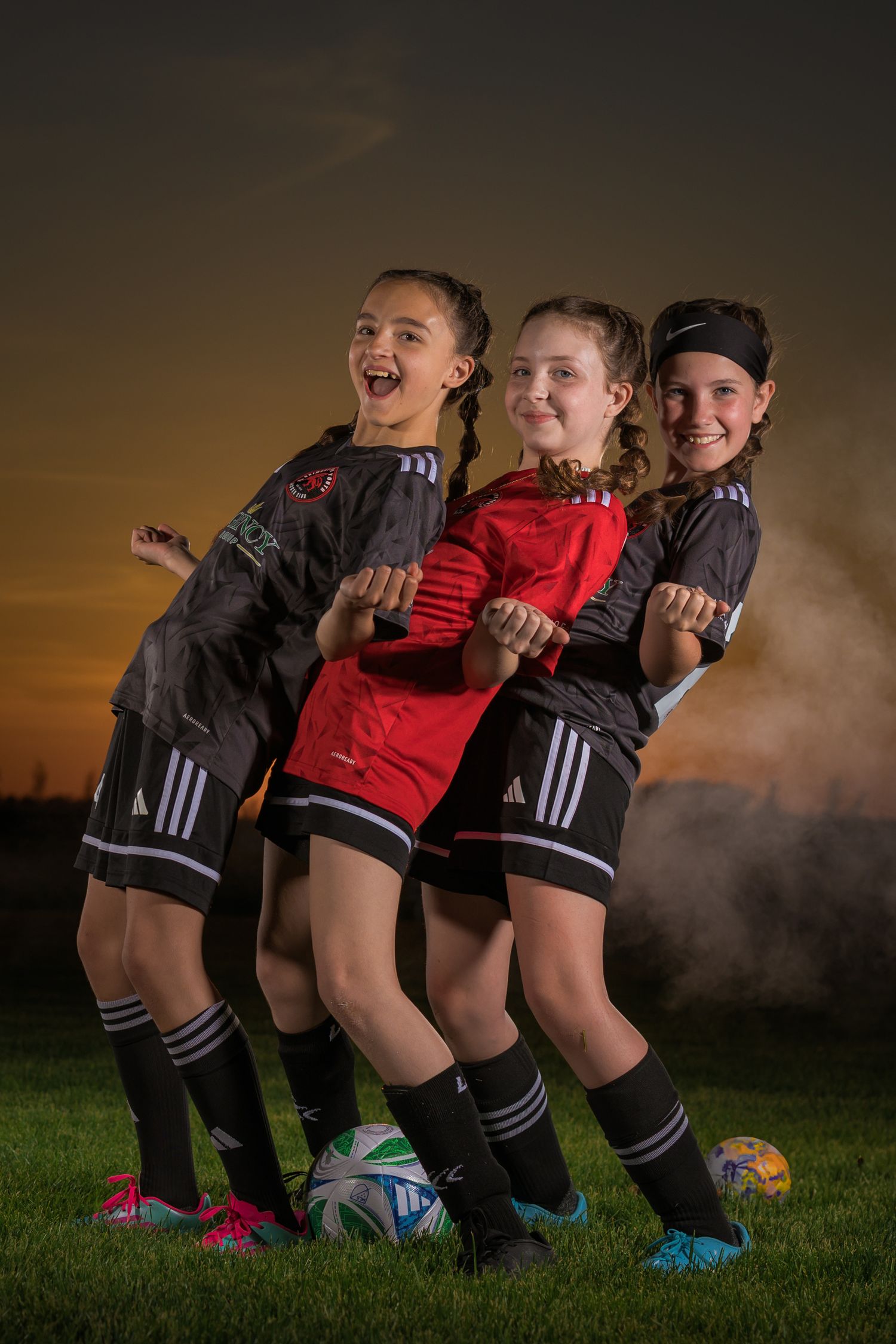 Grimsby Girls Soccer players posing for an outdoor portrait in Grimsby Niagara