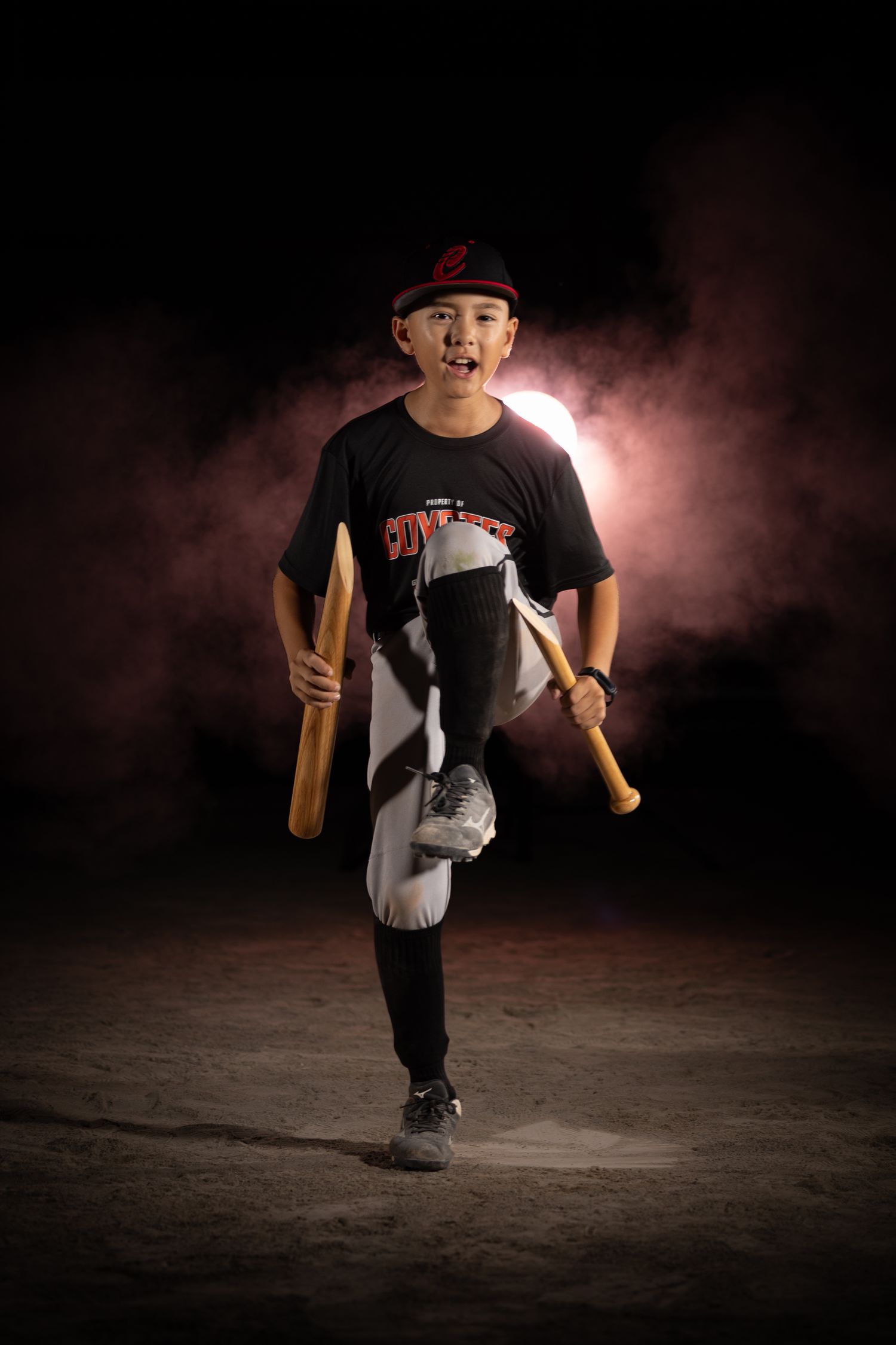 Grimsby Coyote Boys Baseball player posing for an outdoor portrait session in Grimsby Niagara