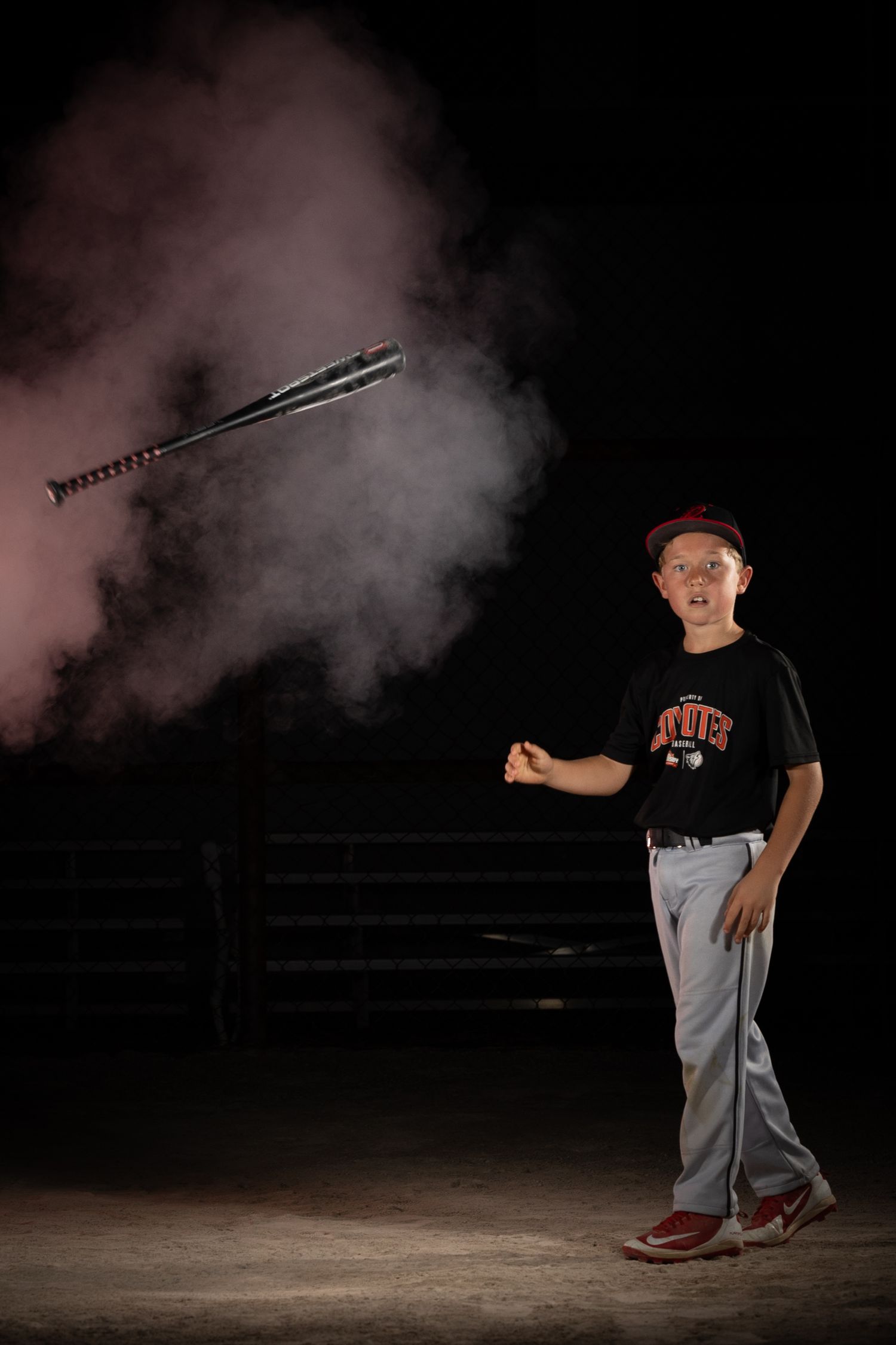 Grimsby Coyote Boys Baseball player posing for an outdoor portrait session in Grimsby Niagara