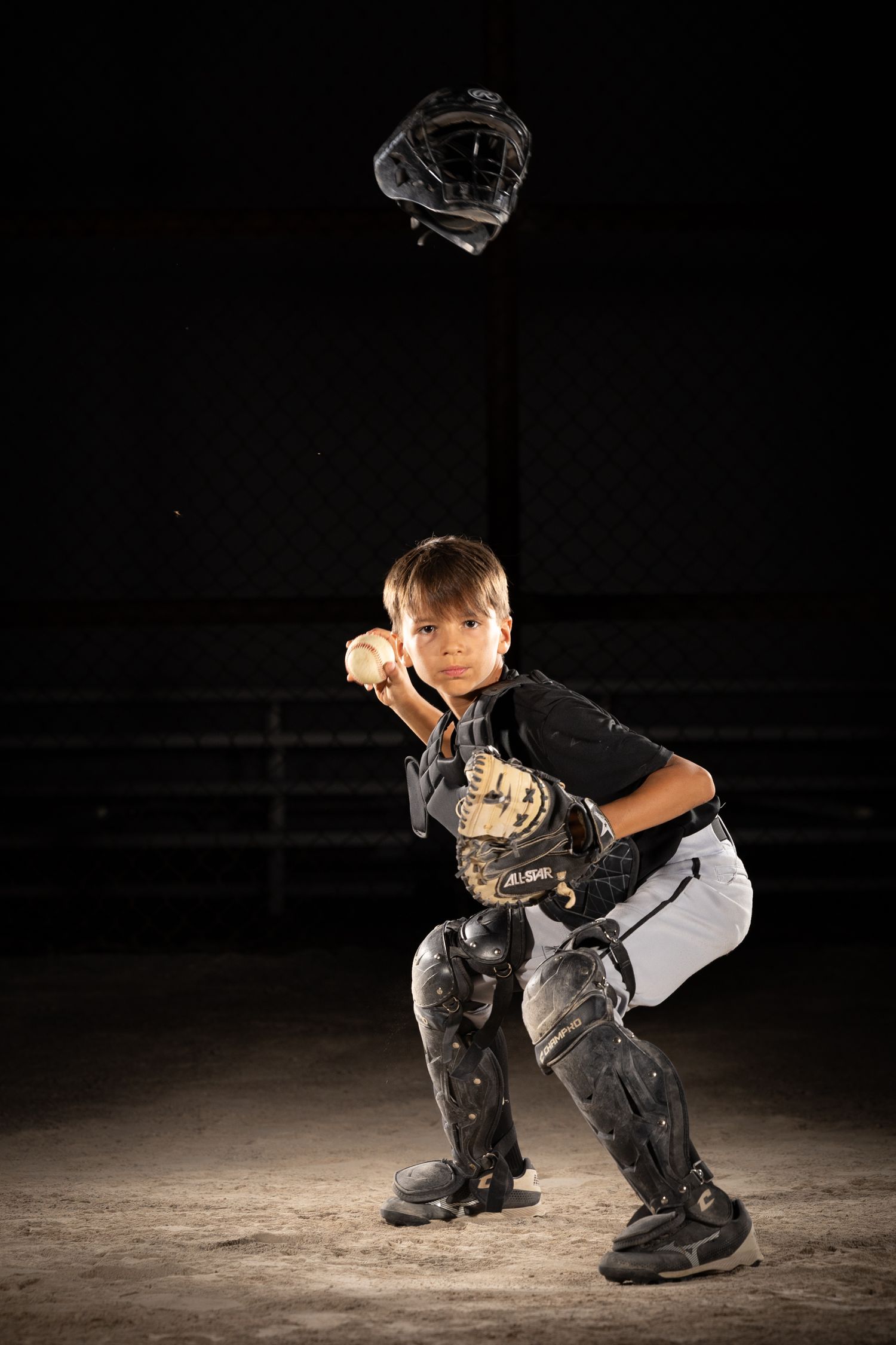 Grimsby Coyote Boys Baseball player posing for an outdoor portrait session in Grimsby Niagara