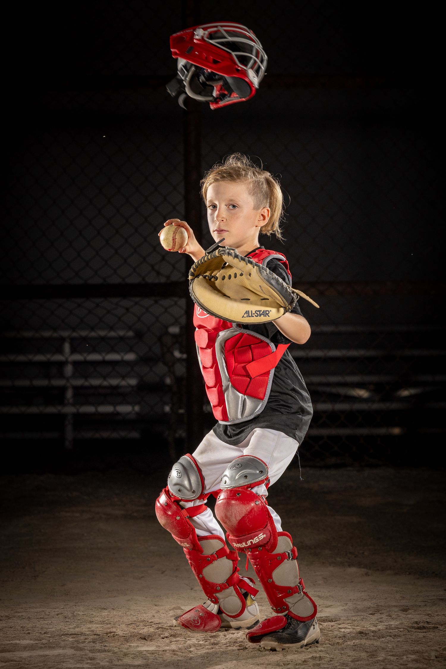 Grimsby Coyote Boys Baseball player posing for an outdoor portrait session in Grimsby Niagara