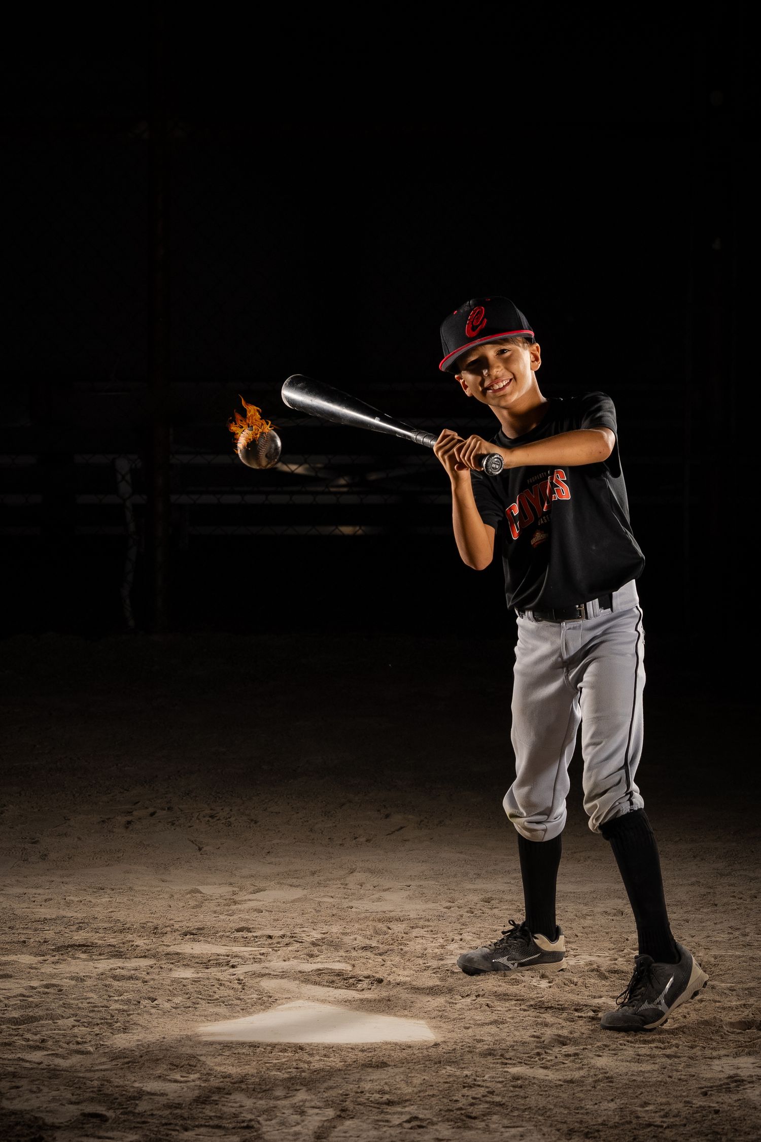 Grimsby Coyote Boys Baseball player posing for an outdoor portrait session in Grimsby Niagara