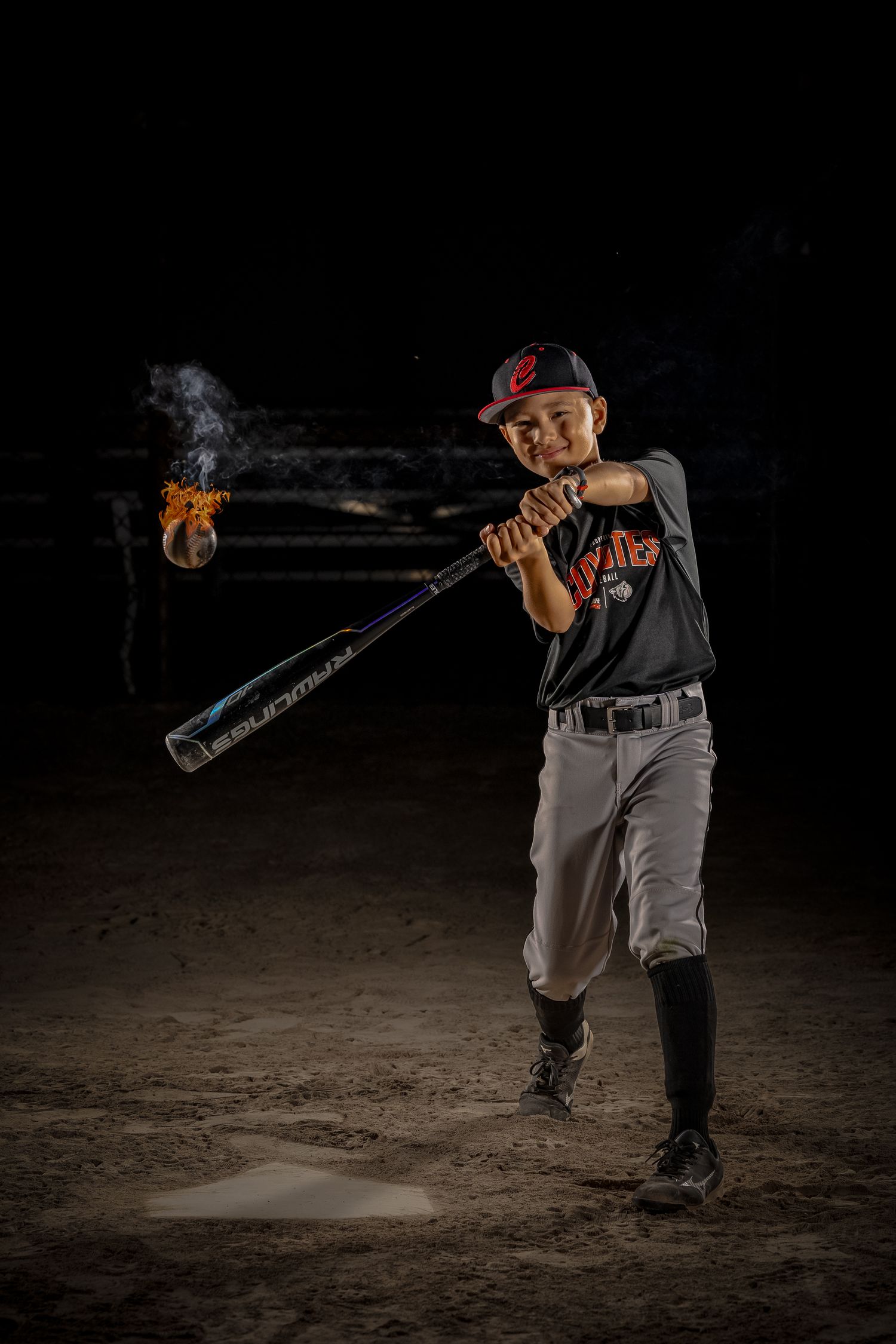 Grimsby Coyote Boys Baseball player posing for an outdoor portrait session in Grimsby Niagara