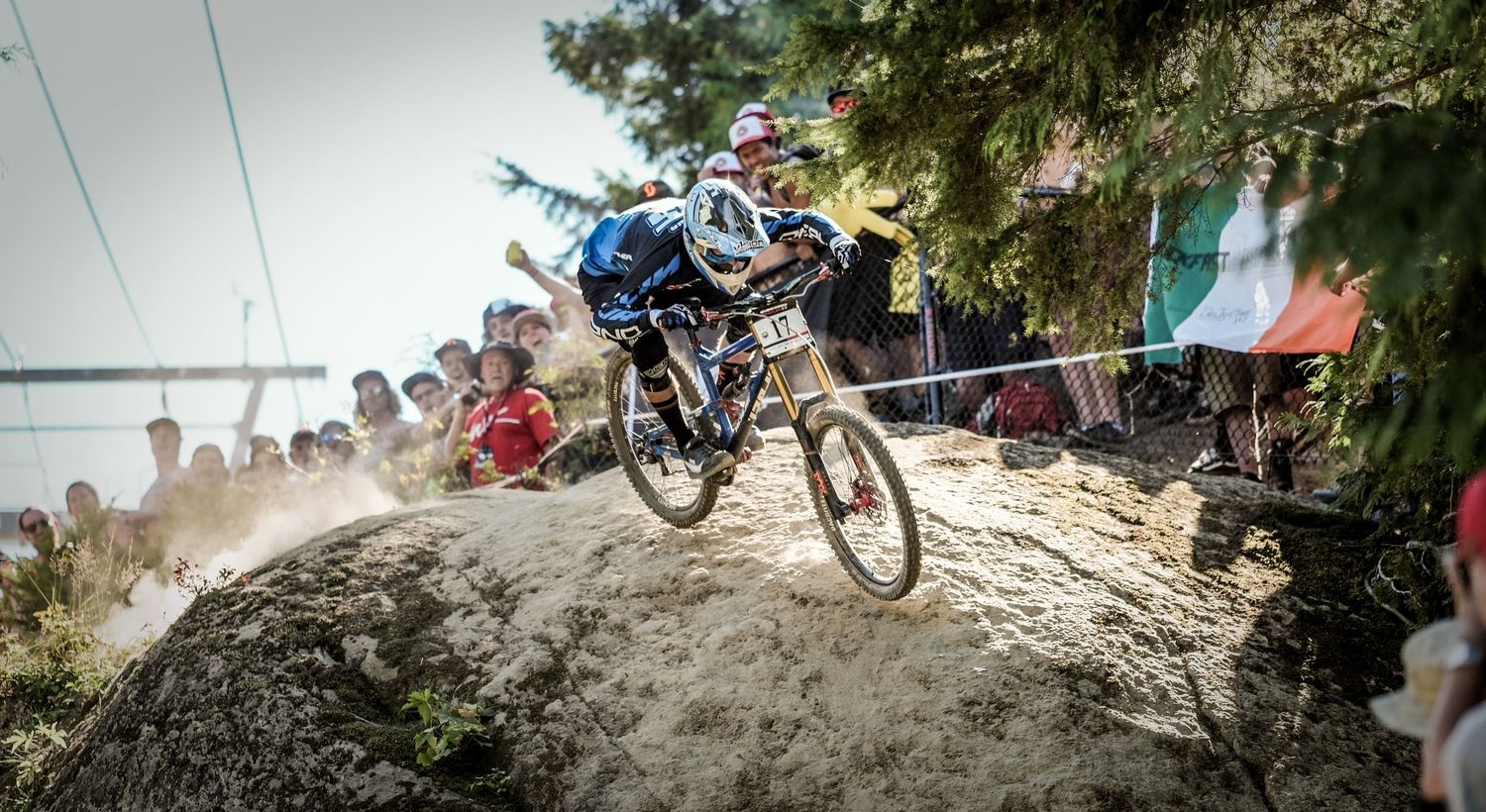 Mountain biker racing downhill on dusty track during competition.
Whistler Mountain Bike Park
Crankworx