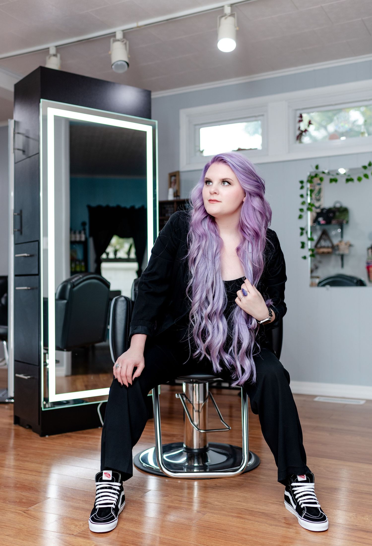 Lincoln, Illinois hairstylist posed for a professional headshot during a salon branding photography session by Julie Loy Photography