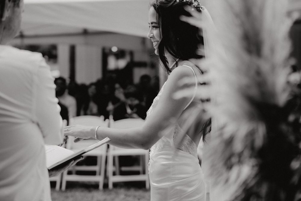 Black and white photo of dancing during a wedding celebration.