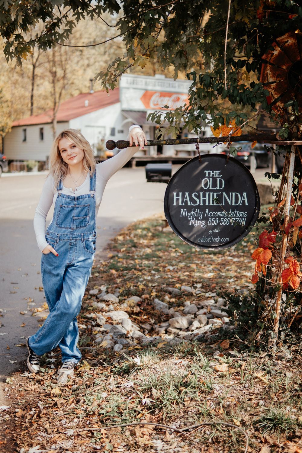 A rustic scene outside The Old Hashienda store with fall foliage.