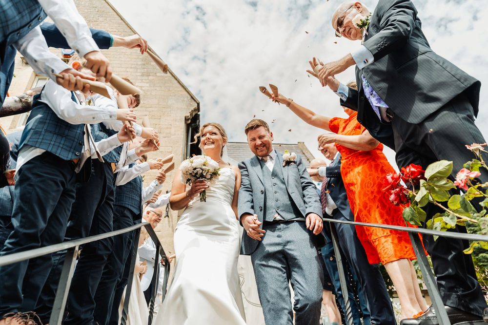 bride and groom confetti shot at bustard inn