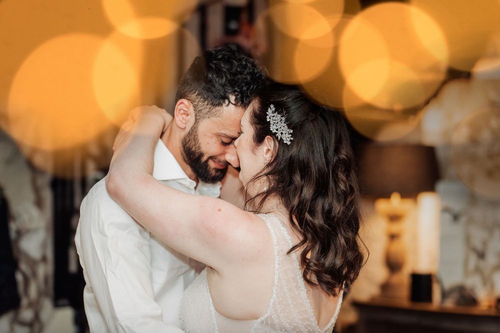 bride and groom having first dance at eyam hall peak district