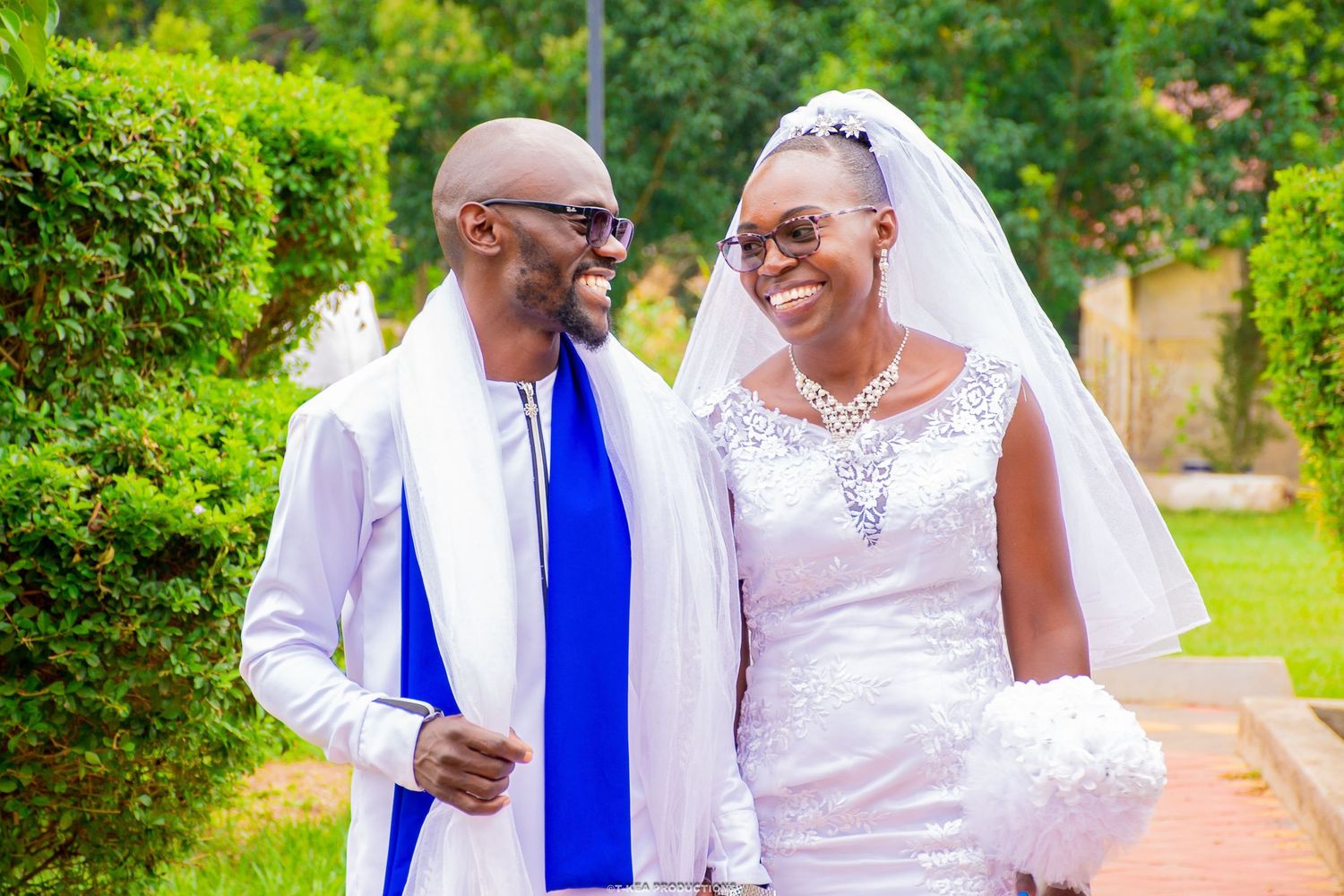 Couple pose for a photo session during their wedding