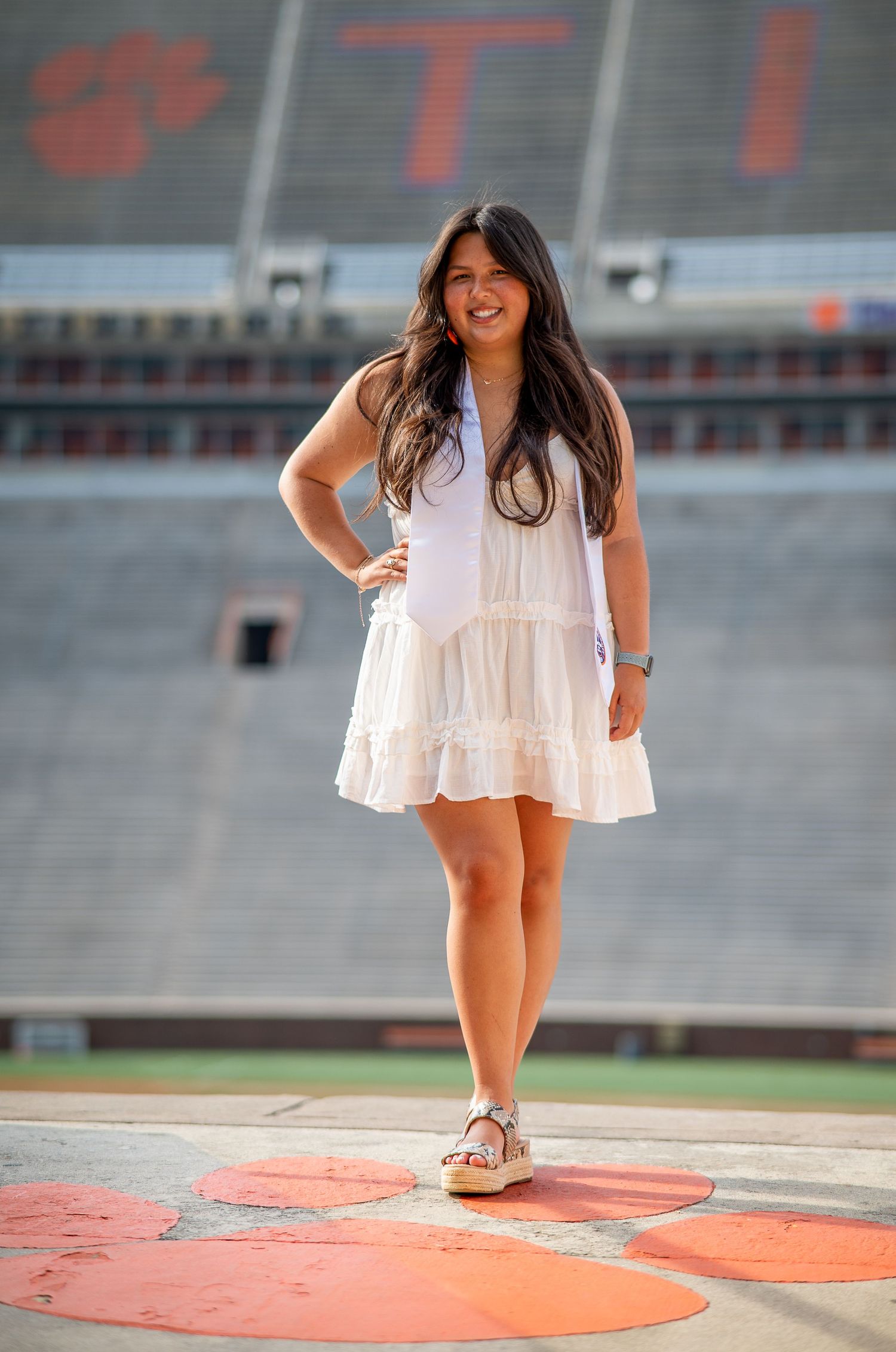 Clemson Graduate with sash in Memorial Stadium, Clemson, South Carolina.