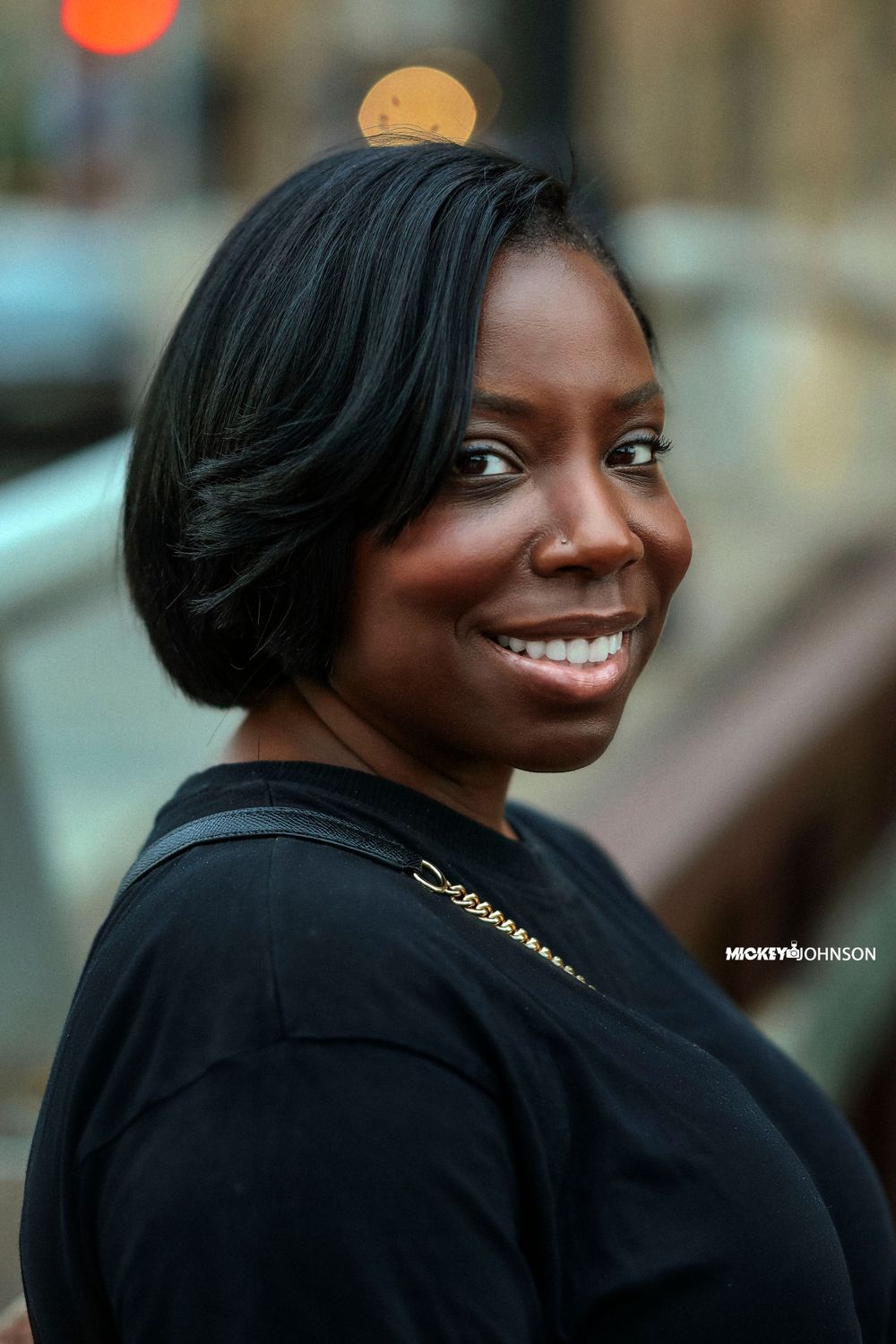 Portrait series showing joyful expressions against urban background.