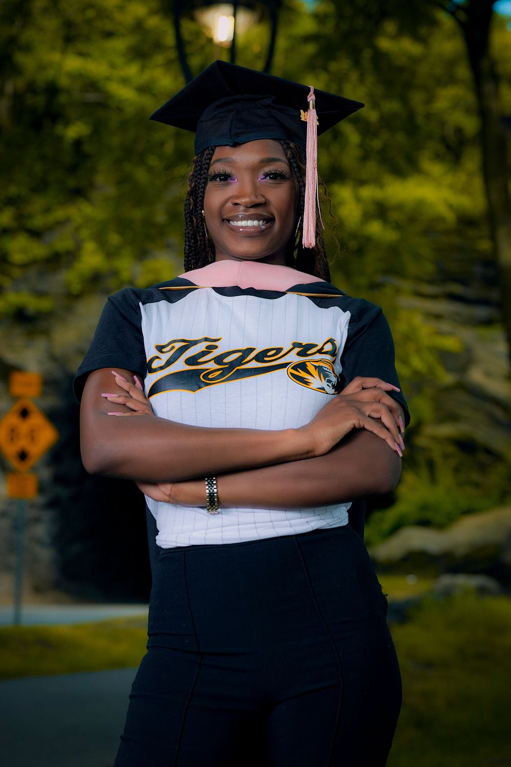 Graduation photos featuring Tigers university apparel and traditional academic regalia.