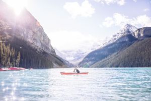A man and woman in a canoe