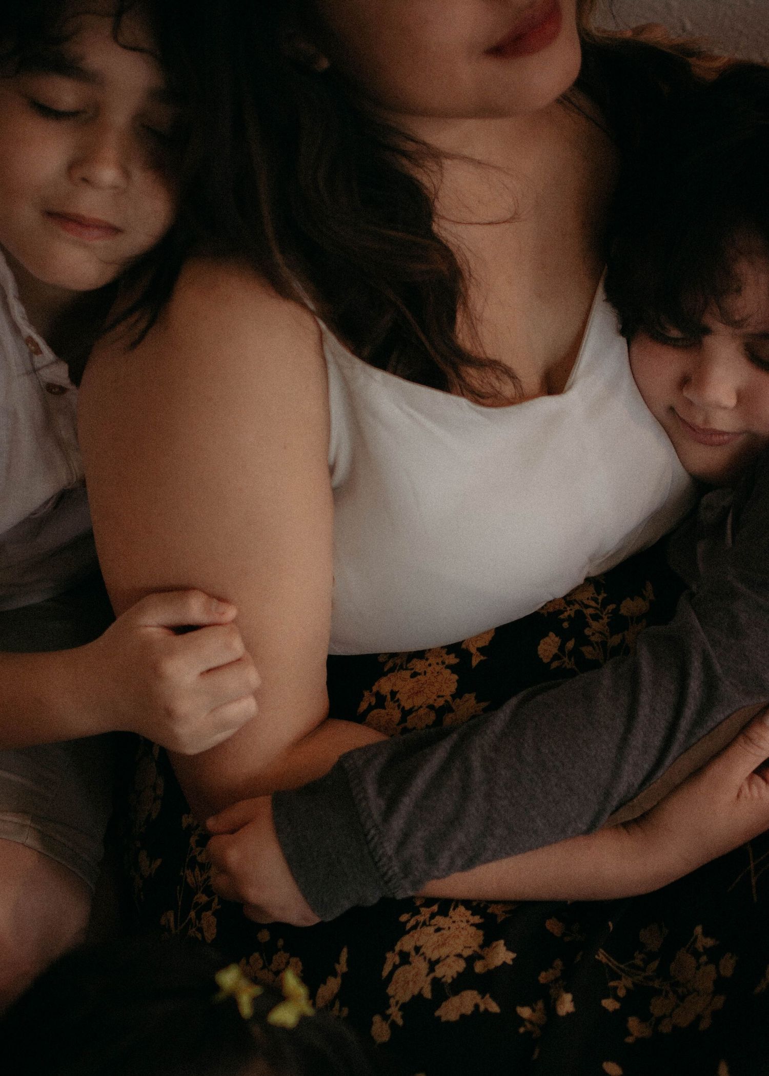 People share an intimate moment of closeness and comfort.