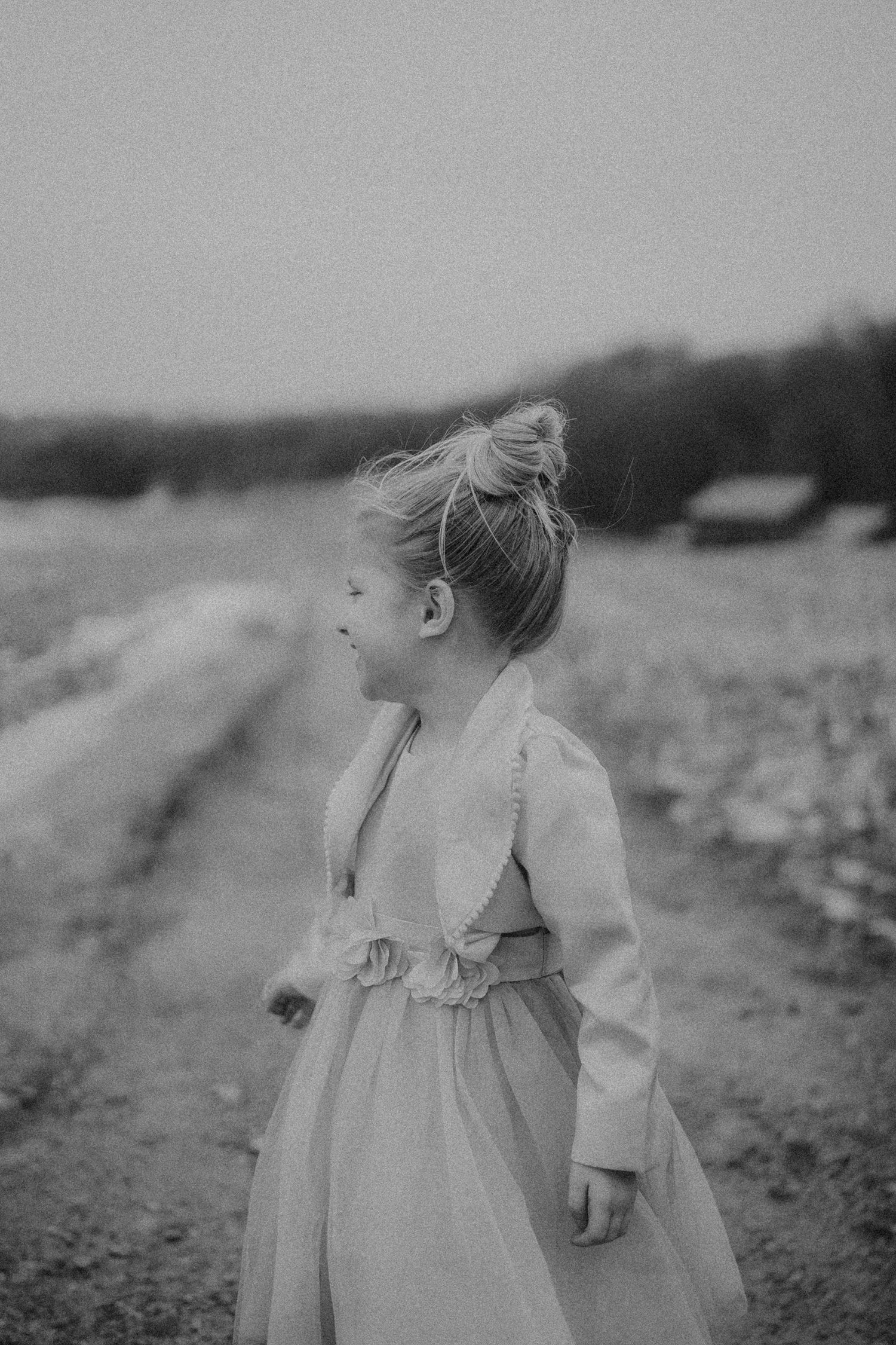 Wisconsin photographer capturing a little girl in an open field.