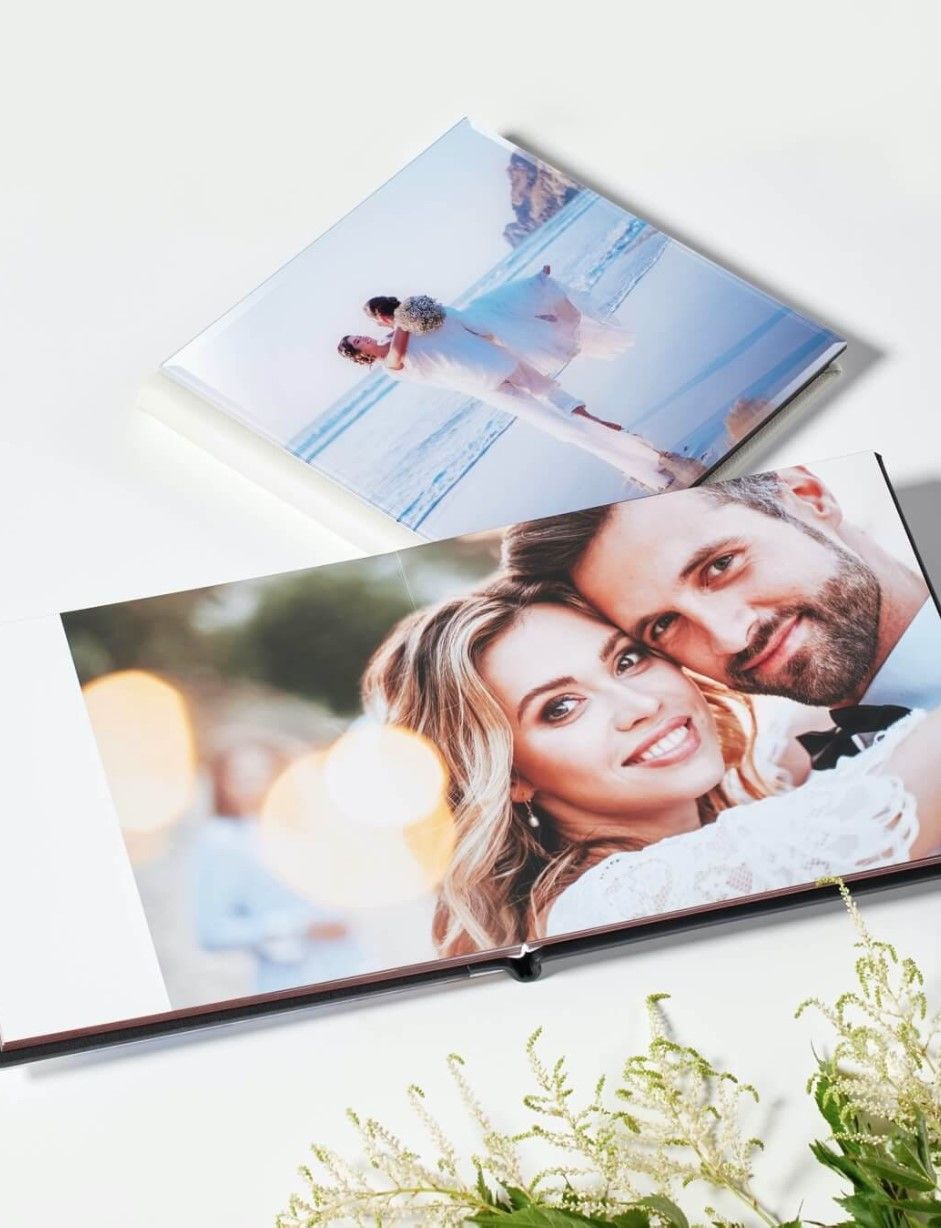 Professional photo album with high-quality printed pages showcasing a wedding.