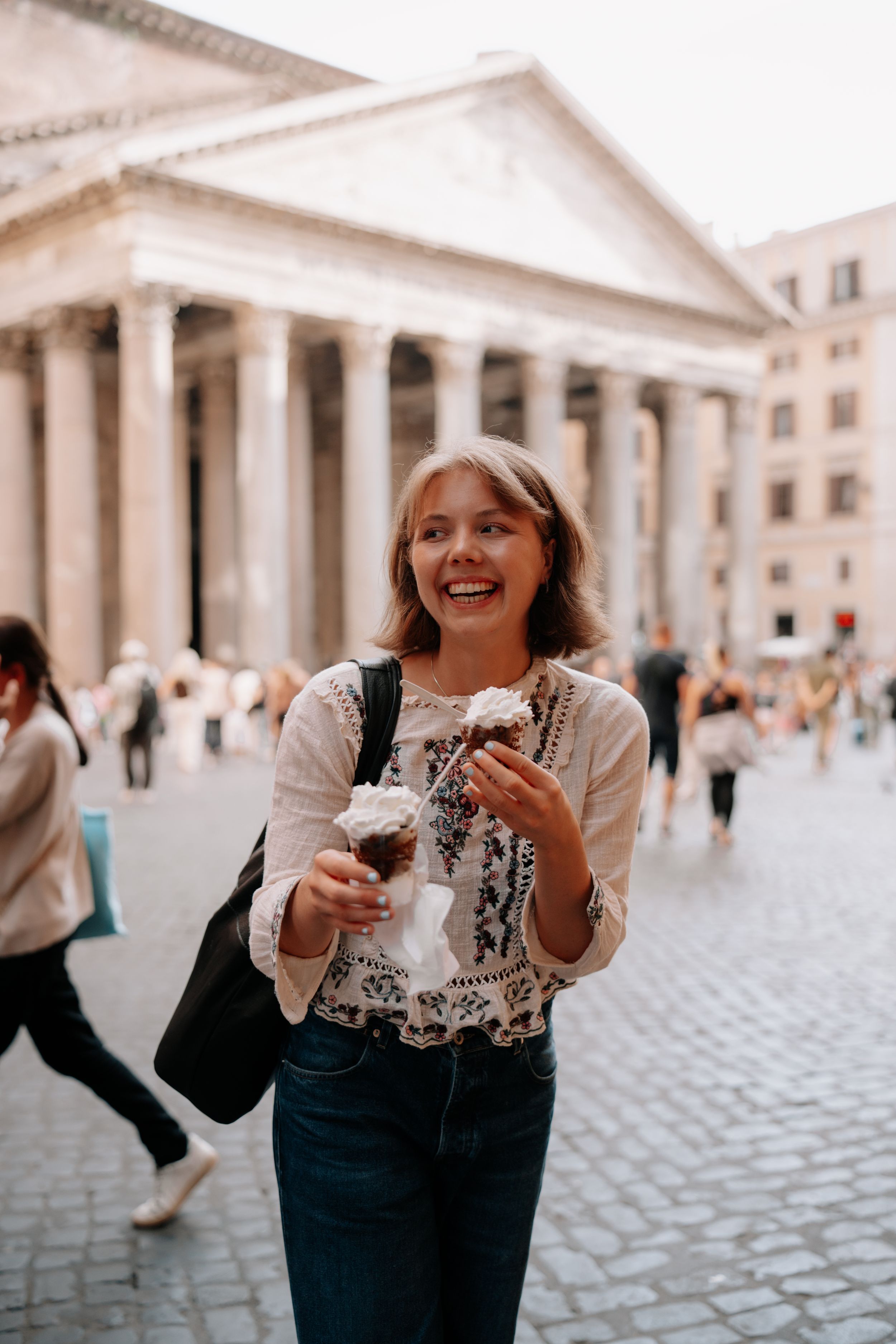 Enjoying ice cream in front of the Pantheon Rome.