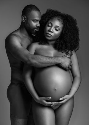 Black and white artistic maternity photo series showing intimate moments between a couple during pregnancy.