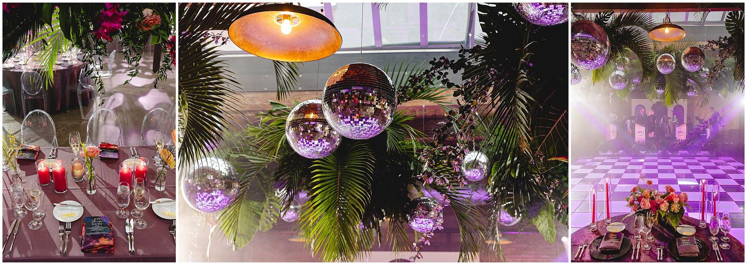 Modern reception decor featuring hanging glass ornaments and pink floral arrangements.