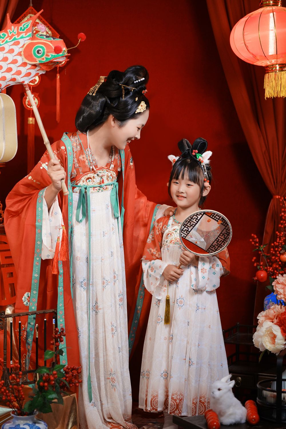 Cinematic warm-toned Tang Dynasty Hanfu portrait of a 3-generation family celebrating Lunar New Year, by Imagine Image Studio Auckland.