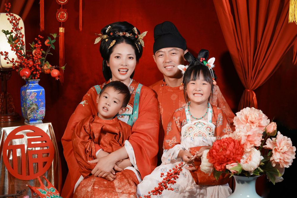 Warm cinematic 3-generation Tang Dynasty Hanfu family portrait for Chinese New Year, captured by Imagine Image Studio Auckland.