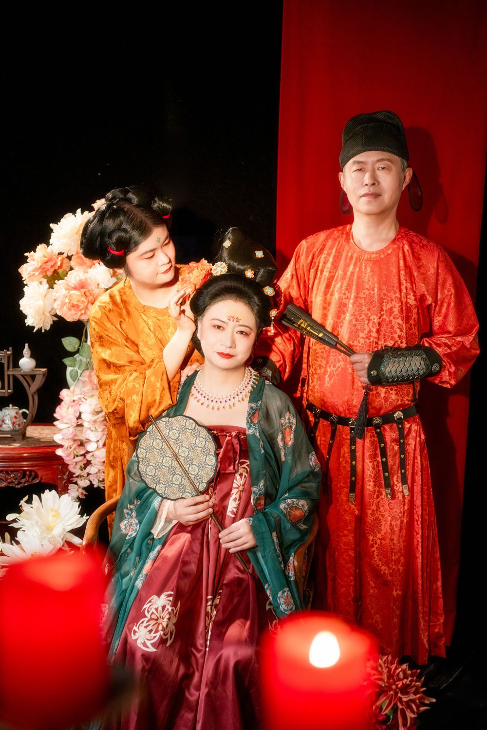 Creative Tang Dynasty Hanfu family portrait with stunning light and shadow studio effects, captured by Imagine Image Studio.
