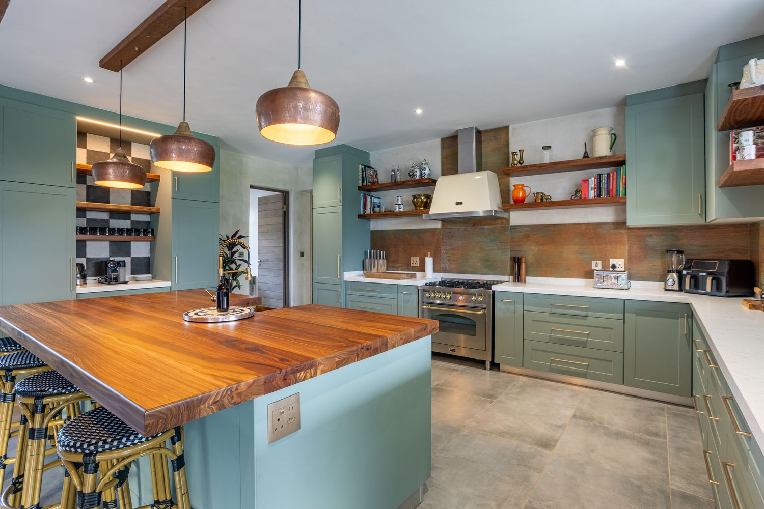 Open-plan kitchen and living area with modern finishes and natural lighting