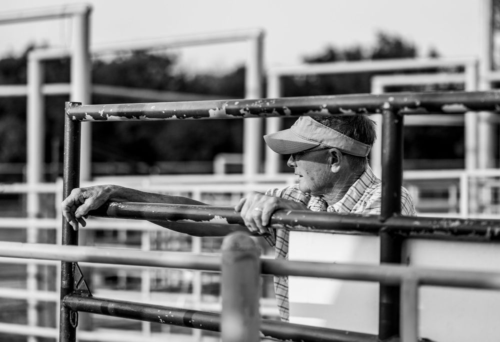Woman watching the events at the county fair.