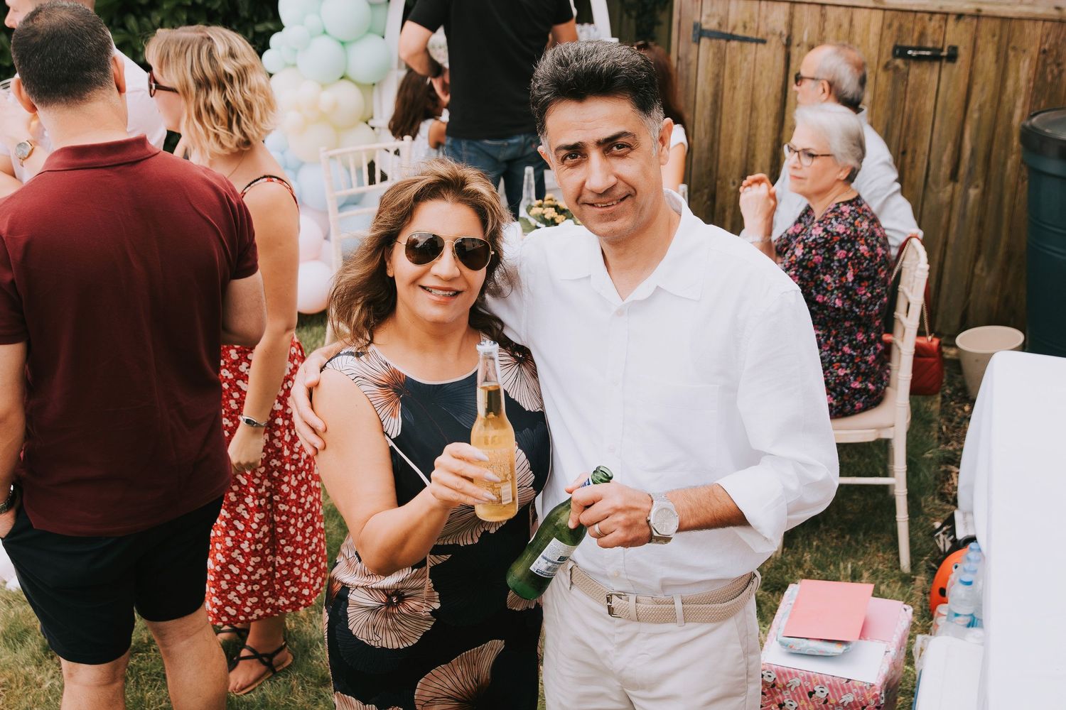 2 guests at a birthday party  smiling