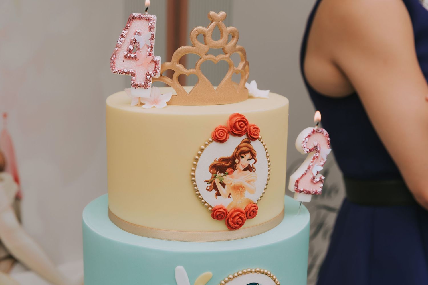 details of 3 tier decorated Disney princess cake