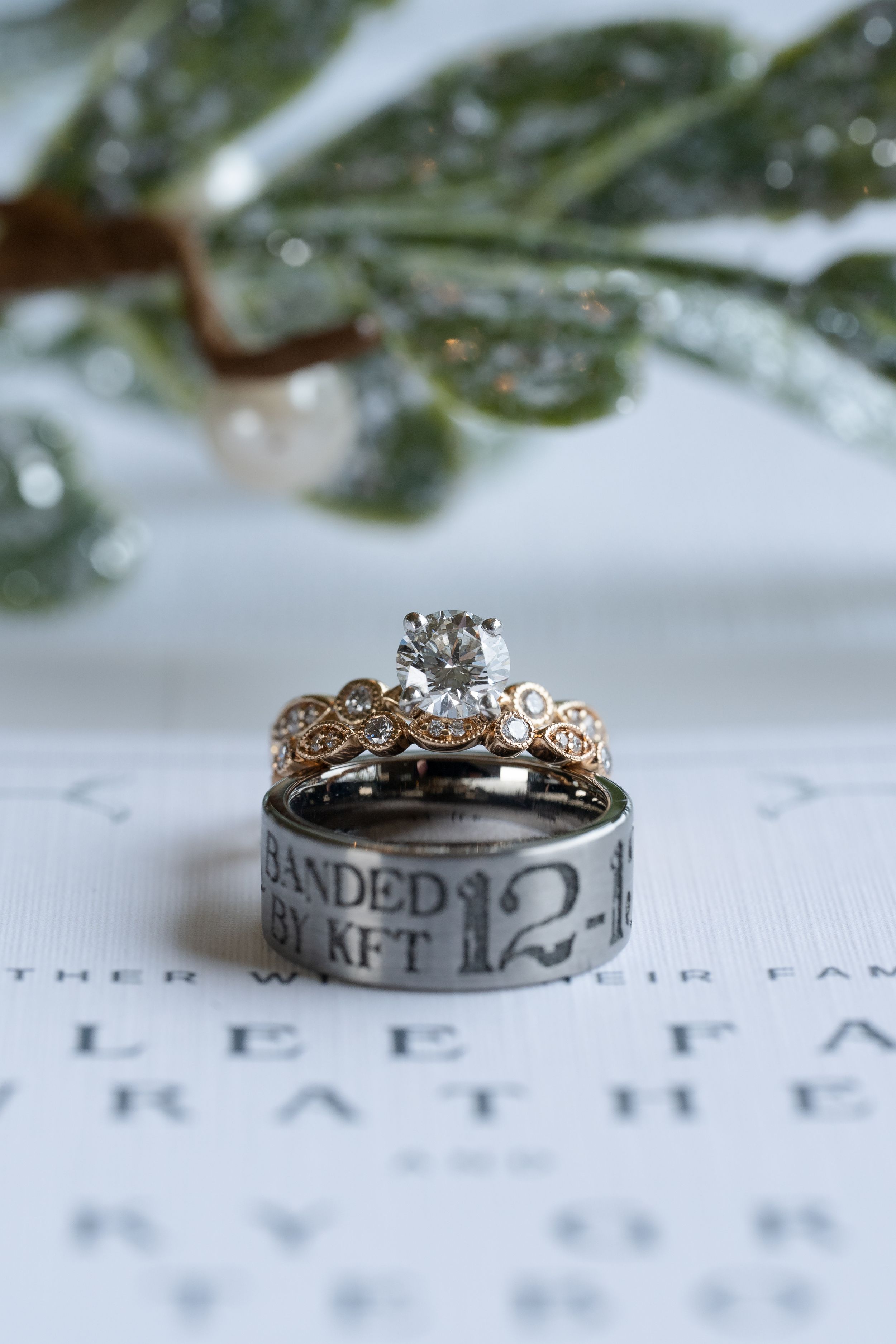 Close-up shots of ornate wedding rings with delicate filigree designs displayed on white paper.