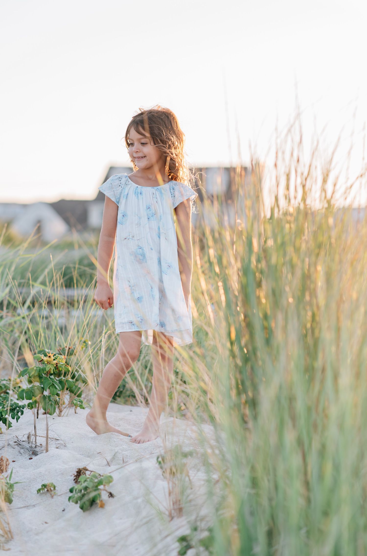 Individual picture of girl on a sandy grass beach in monmouth county nj.