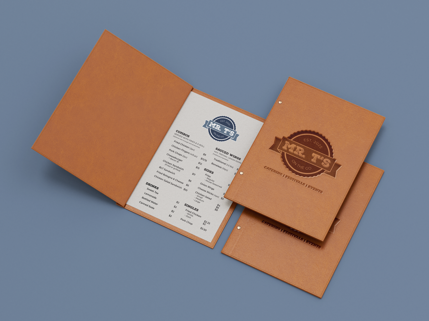 Open cardboard menu folder with a white printed restaurant menu page featuring a circular logo on a blue background.