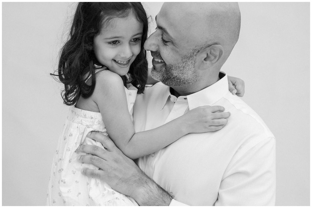St Regis Punta Mita Family Photographer capturing a tender father-daughter moment during a Beach Family Photo Session.