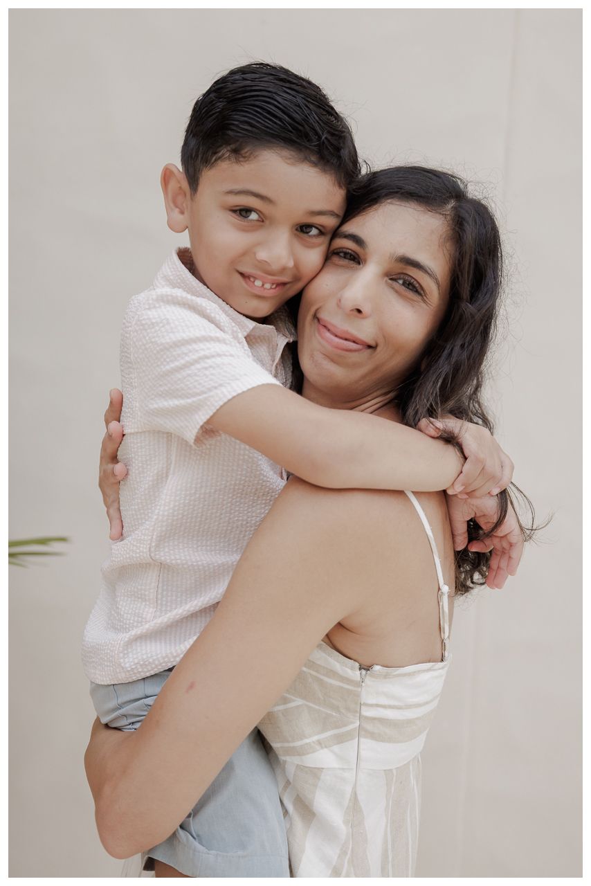 St Regis Punta Mita Family Photographer capturing a warm mother and son portrait with a loving embrace during Punta Mita Family Photos.