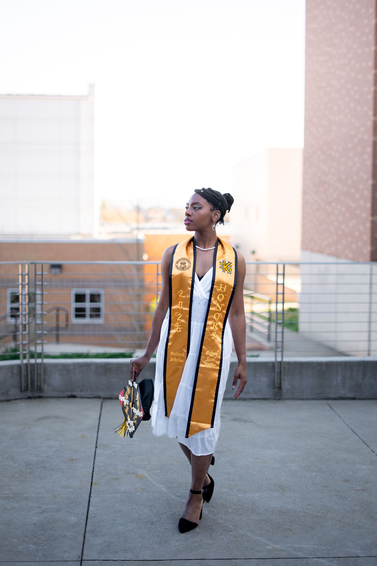 KSU graduation portrait photographer offering grad photos at the classic spots before commencement