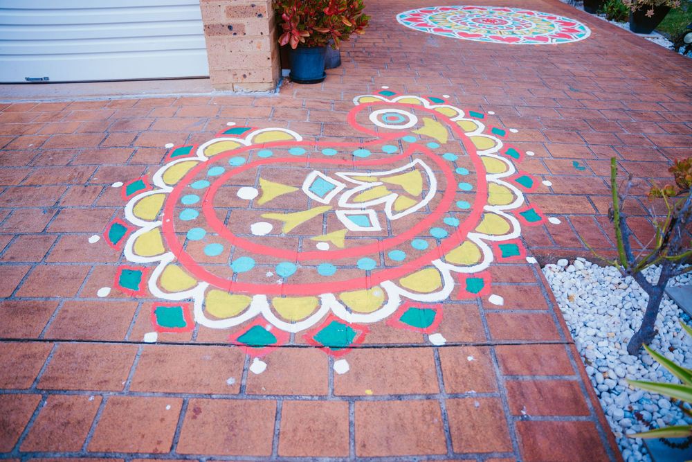 Colourful rangoli floor art welcoming guests to a Sydney Nikah ceremony