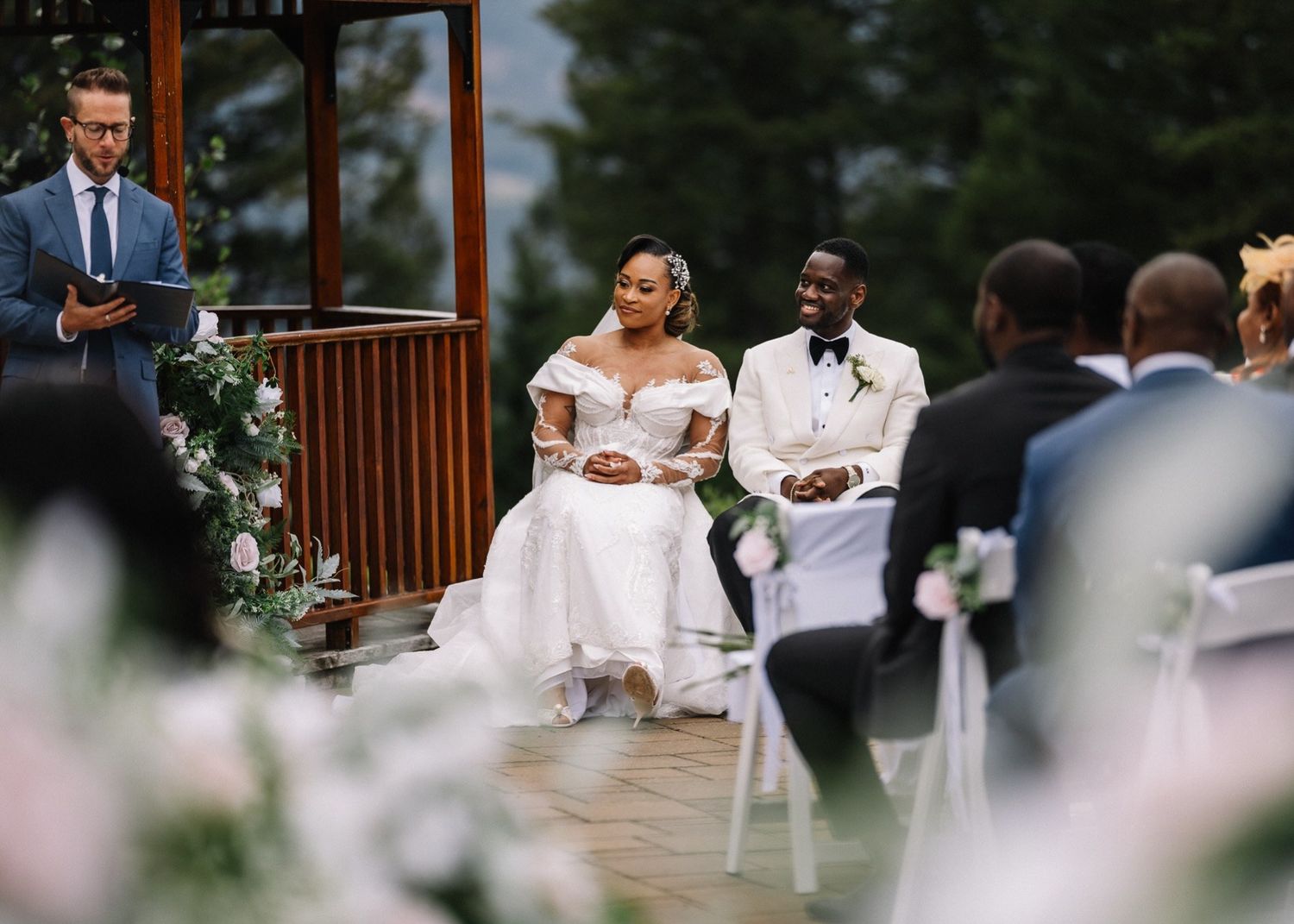 Bride and groom at the Gazebo ceremony with their wedding party, Silvertip Resort