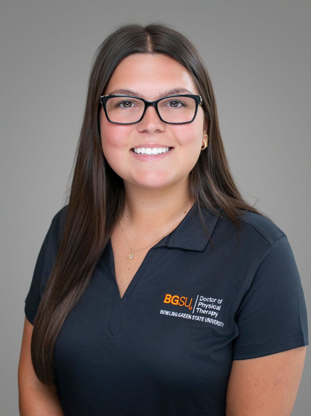 BGSU Doctor of Physical Therapy student smiling in navy polo shirt at Bowling Green State University.