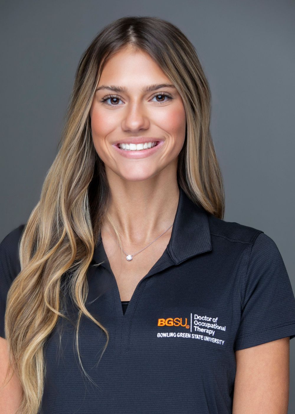 BGSU Doctor of Occupational Therapy student smiling in a dark polo shirt at Bowling Green State University.