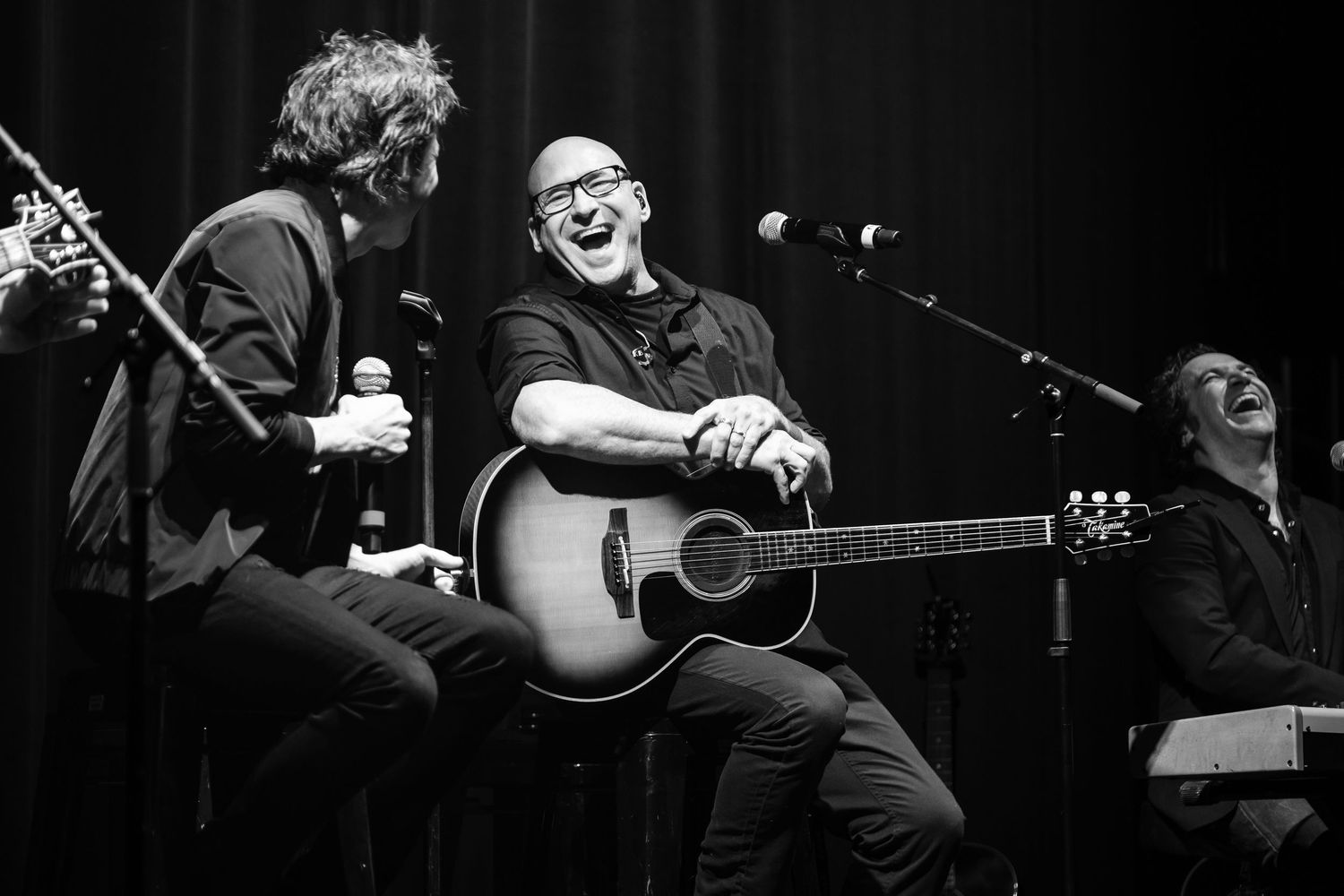 Ken Block and Pat Monahan laugh between songs.