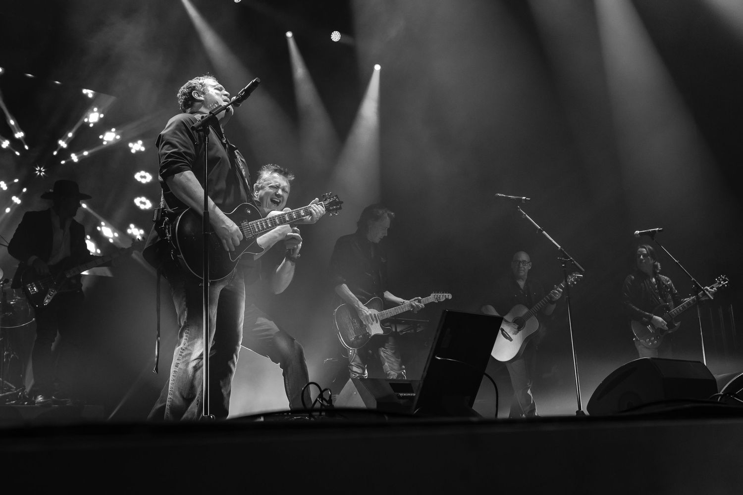 A black and white photo of Sister Hazel preforming at the Philips Center.