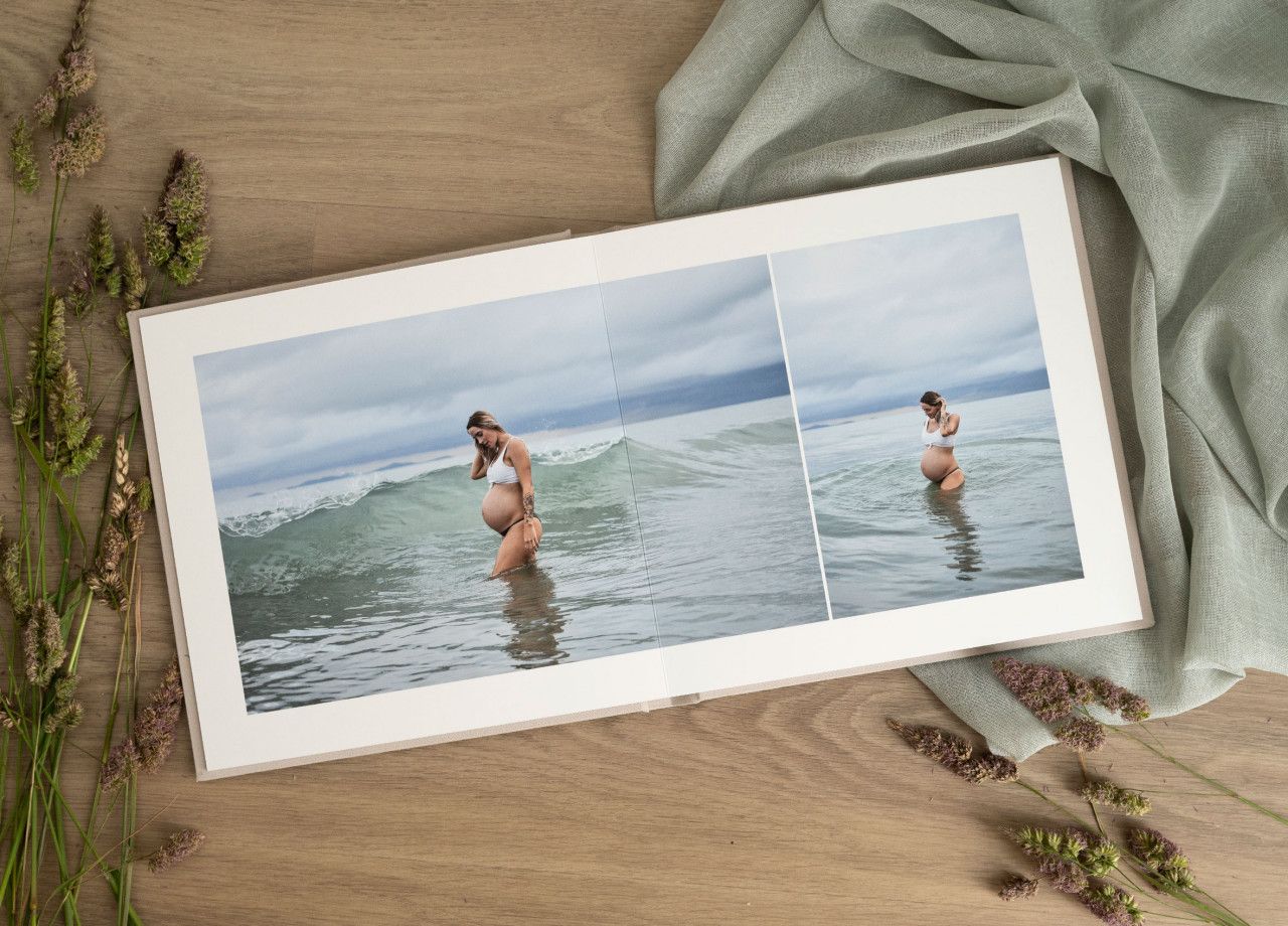 heirloom album showcasing a mother in the beach for her maternity session on the Gold Coast
