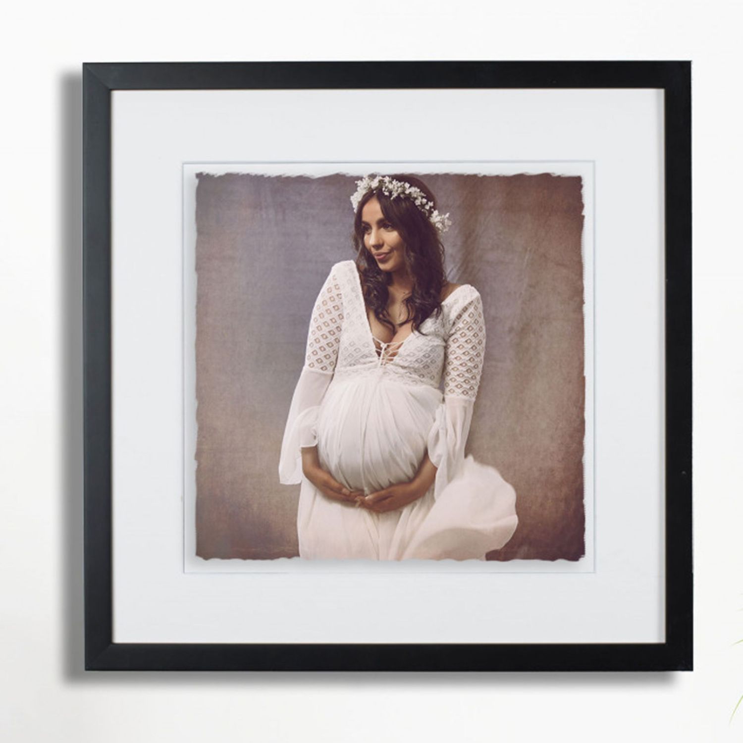 square framed print with hand torn edges for a stunning mother in white at her maternity session