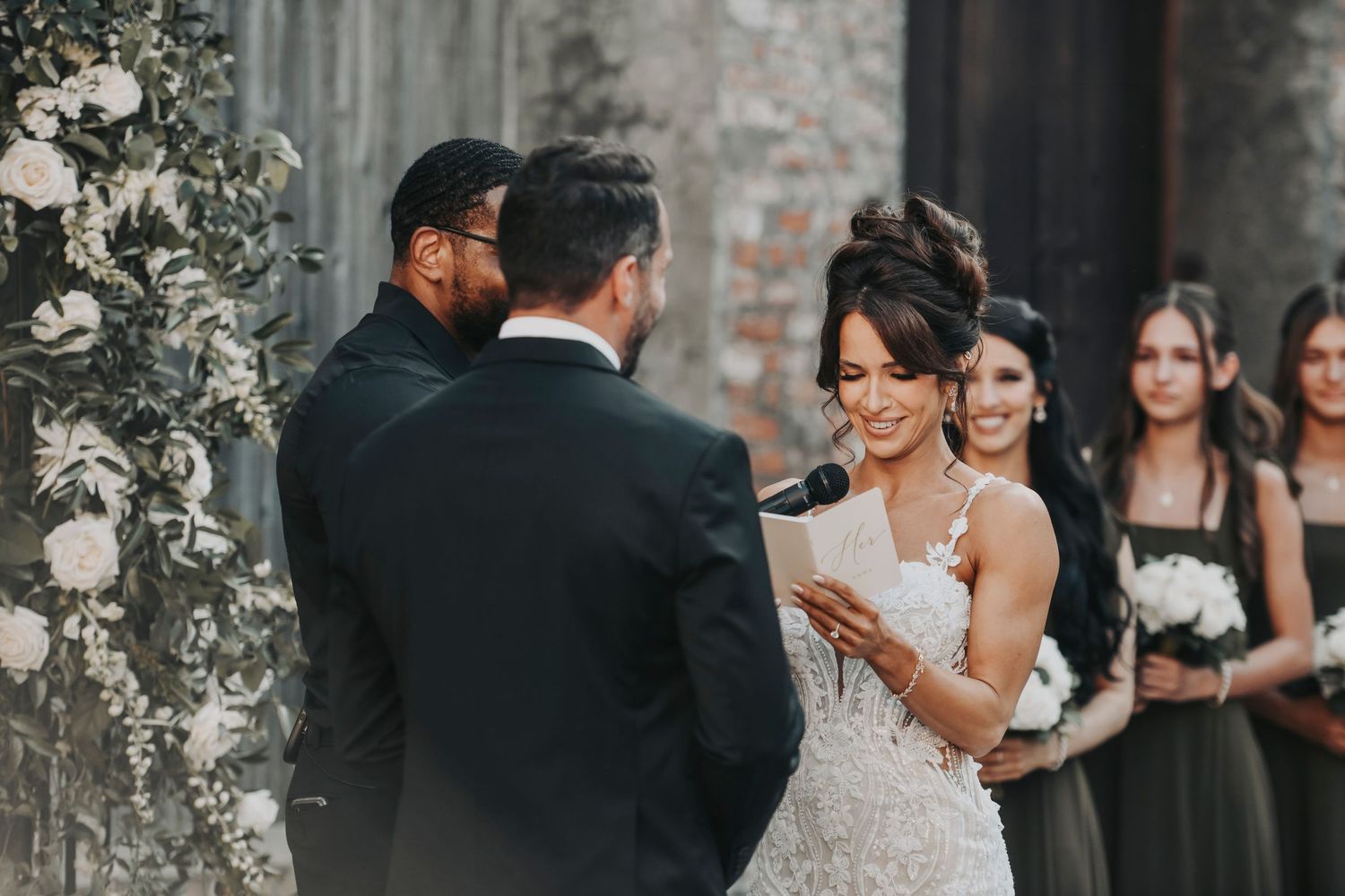 Emotional wedding ceremony moment between Megan and Joel