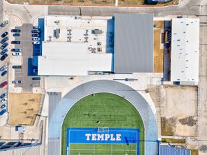 Bird's eye aerial view of Temple High School football stadium and athletic complex facilities.